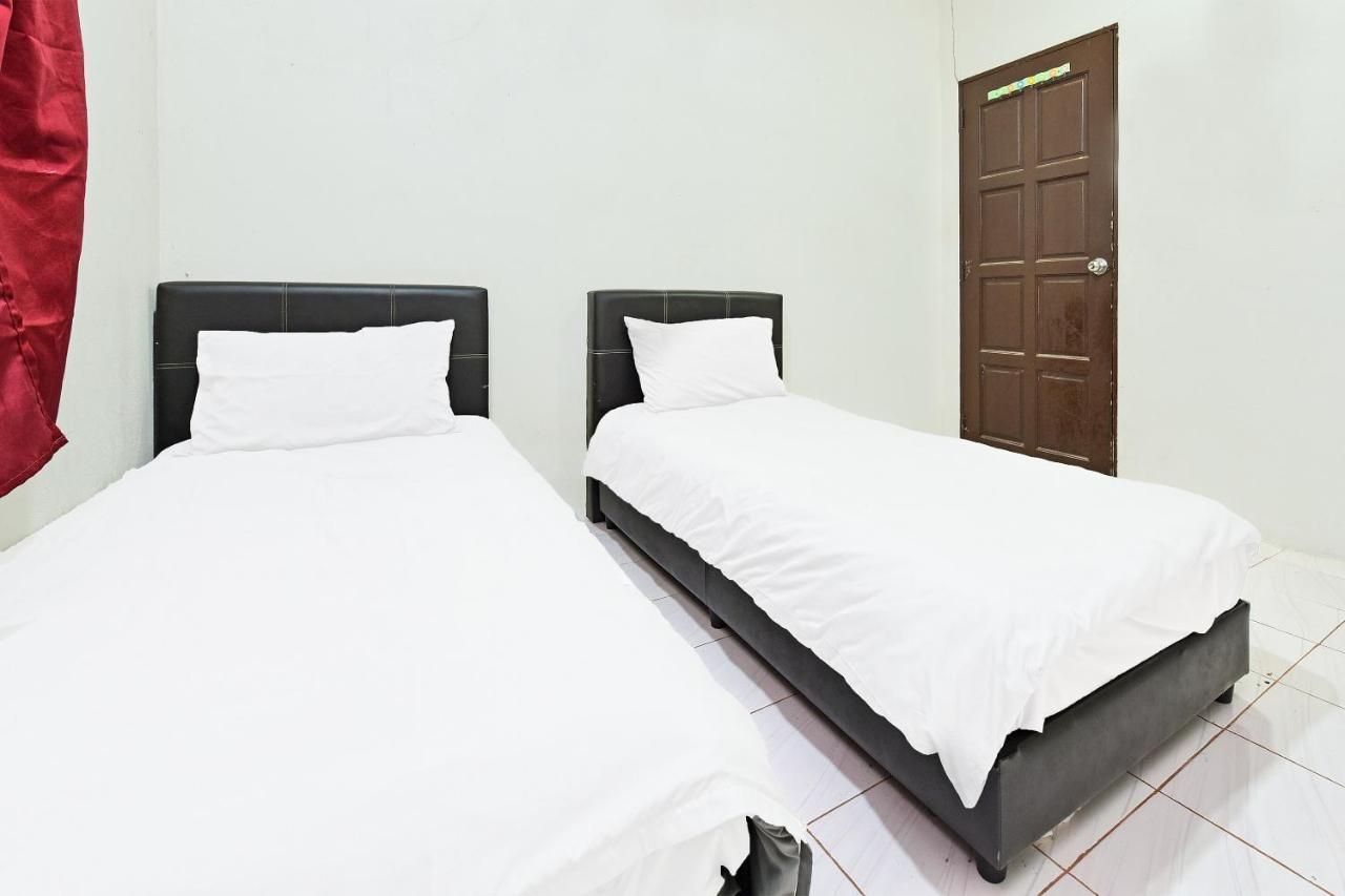 Oyo 90596 Casaria Inn Paka Exterior foto